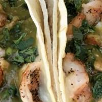 Shrimp Taco · grilled shrimp, melted cheese, salsa verde & fresh cilantro. Served with black beans and spa...