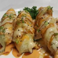 Stuffed Jalapeno (6 Pc) · Deep fried jalapeno stuffed with crab mix and cream cheese drizzled with house sauce.