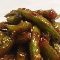 Spicy Edamame · Steamed soybeans sauteed in sweet chili sauce.
