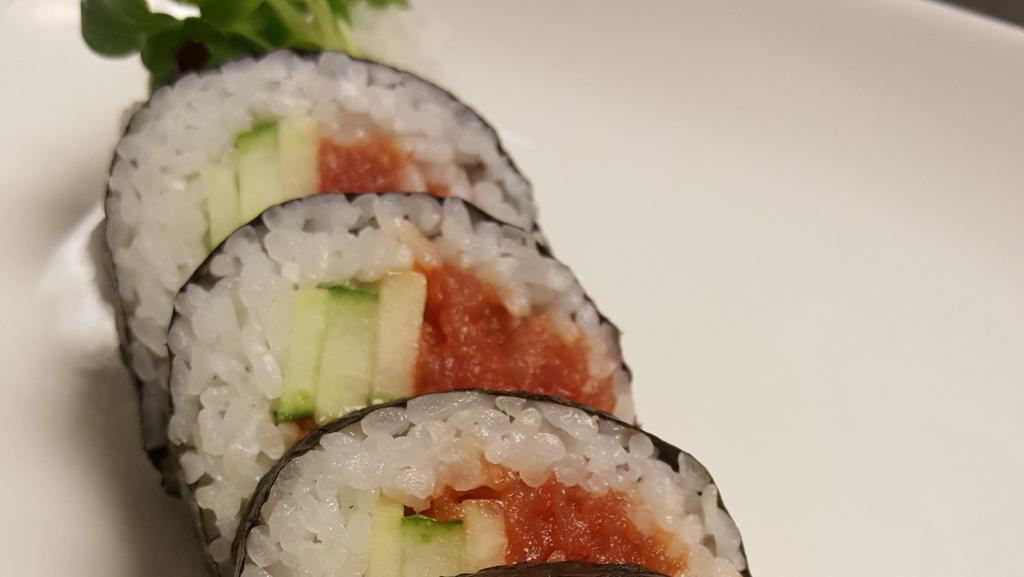 Spicy Tuna · Spicy tuna, cucumber kaiware.

These item may be served raw or undercooked based.