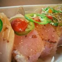 Pepperfin · Sliced white tuna, thin sliced jalapeño. Served with special garlic ponzu sauce.

These item...