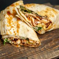 Chicken Breast Breakfast Burrito · Hearty chicken breast, fresh scrambled eggs, crispy hashbrowns, chopped onions, and melted c...