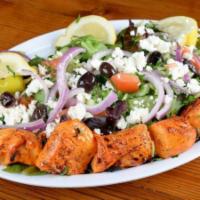 Organic Chicken Greek Salad · One skewer of marinated organic chicken kebab charbroiled to perfection! Fresh organic mixed...