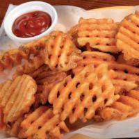 Seasoned Waffle Fries · Fresh waffle cut fires seasoned and crisped to perfection