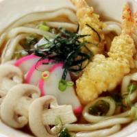Tempura Udon · Udon noodles,  which are thick white wheat flour noodles,  in  fish  broth  with  mushrooms,...