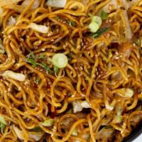 Vegetable Fried Noodles · 411 calories. Yakisoba noodles pan fried with cabbage, peppers, and onions, garnished with s...