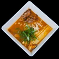 Spicy Miso Ramen · Spicy miso broth, grilled chicken, japanese style ramen noodles, enoki mushrooms, dried mush...