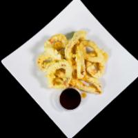 Calamari (Squid) Tempura · Deep fried Calamari tempura and tempura sauce.