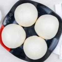 King Steamed Buns W/ Sweet Red Bean · 4 large king sized pieces.