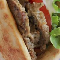 Gyro Sandwich · Beef and lamb meat on pita bread, tomato, onion, lettuce, topped with yogurt and cucumber sa...