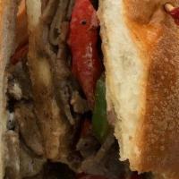 Philly Cheese Steak Sandwich · Beef, onion, cheese, green bell pepper and mayo.