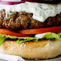 Greek Lamb Burger · 8oz Lamb Patty, Tzatziki sauce, Lettuce , Onions, Tomato, Feta Cheese.