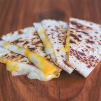 #5 Just The Cheese · Your choice of cheese on a warm fresh flour or corn tortilla