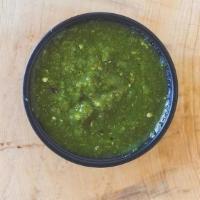 Spicy Salsa Verde - Sides · Fresh tomatillos, cilantro, serranos, garlic, onions, lime (hot) salsa