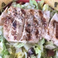 Tostada Chicken Salad · Seasoned chicken, shredded romaine, diced tomatoes, onions, sliced black olives, Jack, and C...