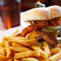 Mandango Burger · 1/2-lb. ground chuck burger topped with melted choice of cheese, lettuce, tomato, red onion,...