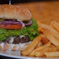 Monterey Burger · 1/2-lb. ground chuck burger, melted Jack cheese, smoked bacon, sautéed mushrooms, topped wit...
