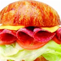 Salami Croissant Sandwich · Salami, lettuce, tomato, and cheese.  Includes mayonnaise