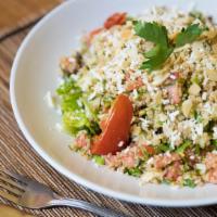 Quinoa Salad · Organic quinoa tossed with fresh, diced tomatoes, cucumbers, finely diced green onions, chop...