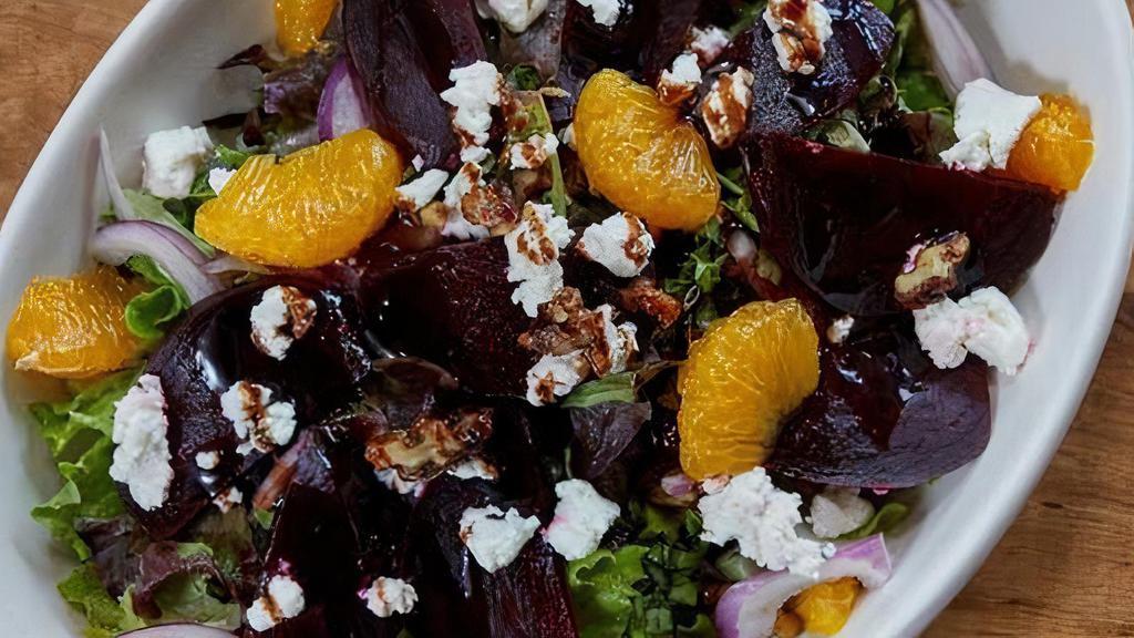 Roasted Beetroot & Goat Cheese Salad · Gluten-free. Mixed greens, roasted beets, goat cheese, candied walnuts, mandarin oranges, fresh basil, sliced red onions with balsamic drizzle.