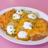 8A Enchiladas Suiza · Two chicken enchiladas topped with tomatillo sauce, melted cheese, and sour cream. Served wi...