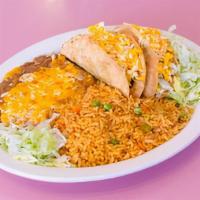 2 Two Tacos (Ground Beef Or Chicken) · Served with rice and beans.