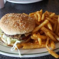 Mushroom Burger · Seasoned and grilled to order. Served on a toasted sesame bun with lettuce, tomatoes, pickle...