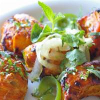 Chicken Tikka · All white meat  Boneless chicken, deeply marinated in aromatic spices, grilled on skewers