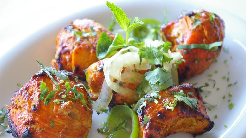 Chicken Tikka · All white meat  Boneless chicken, deeply marinated in aromatic spices, grilled on skewers