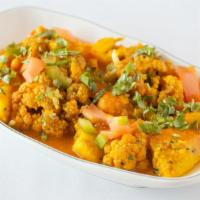 Aloo Gobi · Fresh cauliflower & sautéed potatoes cooked w/ mild spices