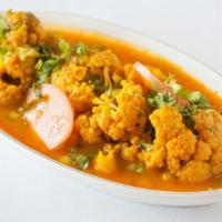 Gobi Bhajee · Fresh Cauliflower sautéed w/Bell pepper,tomato,onion & herbs