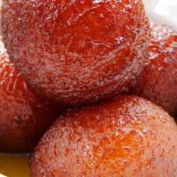 Gulap Jamun · Rich Pastry Balls Delicate inside w/a light-fried crust cooked in sweet syrup