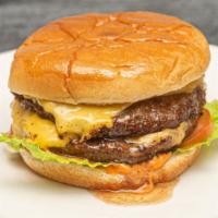 Double Cheeseburger · If one juicy beef patty is unbelievably tasty, then two juicy beef patties must be twice as ...