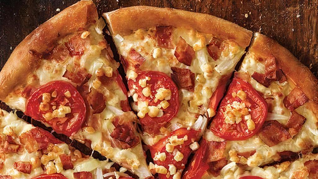 White Cheezy Pizza (Small, 6 Slices) · Bacon, onions, sliced tomatoes, white sauce, and our signature three cheeses, plus feta.