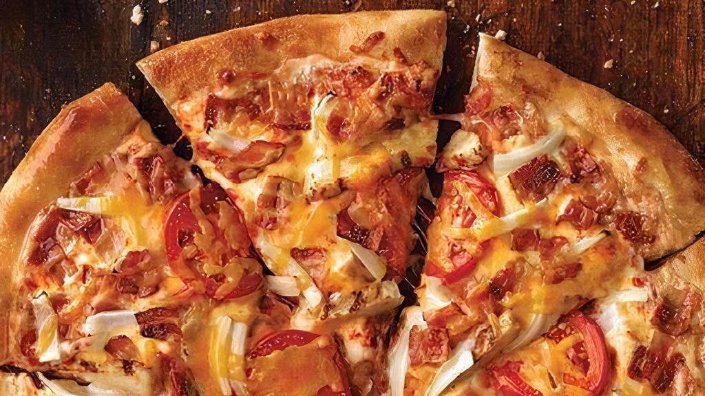 Chicken Fresco Pizza (Large, 8 Slices) · Grilled chicken, bacon, onions, sliced tomatoes, our signature sauce, and three-cheese blend, plus cheddar. Original crust: 370 cal. per slice, thick crust: 420 cal. per slice, thin crust: 310 cal. per 1/6th pizza.