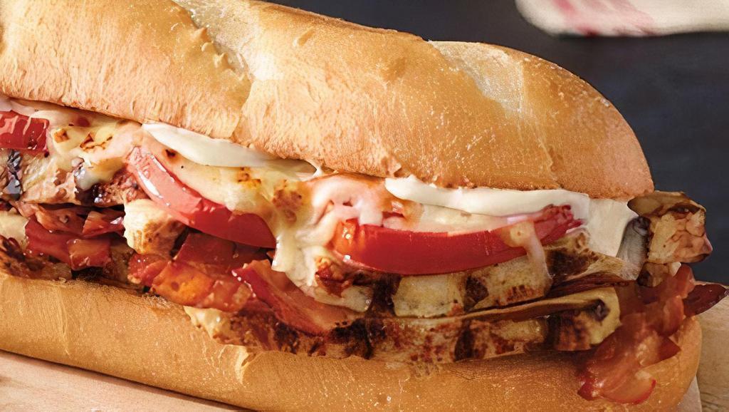 Chicken Club · Grilled chicken, bacon, tomatoes, mayo, and our signature three cheeses. 640 / 1,290 cal.
