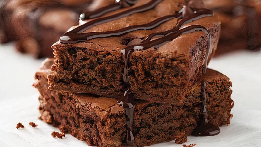 Double Chocolate Brownie · Made with Ghirardelli chocolate and topped with a drizzle of Ghirardelli chocolate sauce. Four servings. 320 cal. per serving.