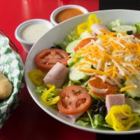 Antipasto Salad Large  · lettuce, tomatoes, cucumbers, pepperoni, ham, banana peppers, black olives & cheese