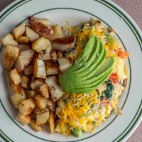 Vegetarian Omelet · Onions, bell pepper, mushroom, tomato, spinach, avocado, jack, and cheddar cheese. Served wi...
