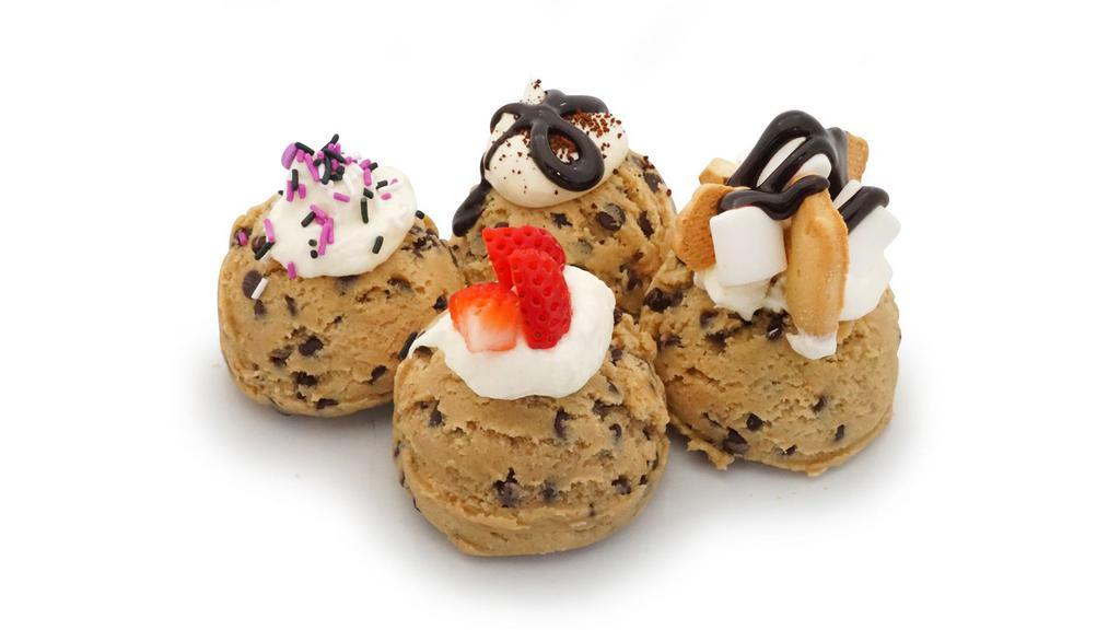 Cookie Dough Scoop - Build Your Own · our homemade cookie dough topped with one frosting and one topping of your choice.