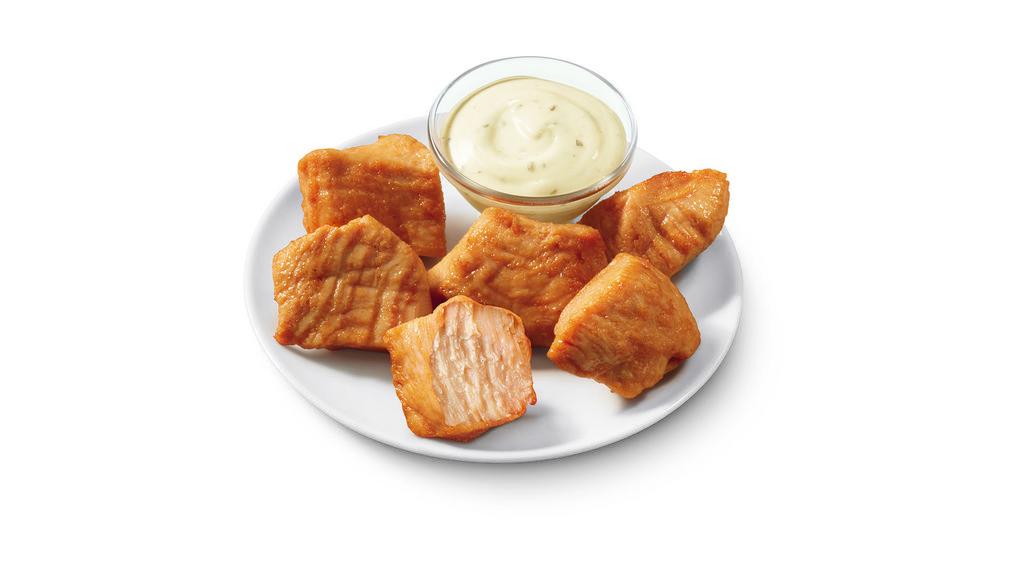 Rotisserie-Style Chicken Bites - Regular · DQ’s new 100% white meat, juicy, tender, rotisserie-style chicken bites served with house-made Hidden Valley® Ranch dipping sauce.