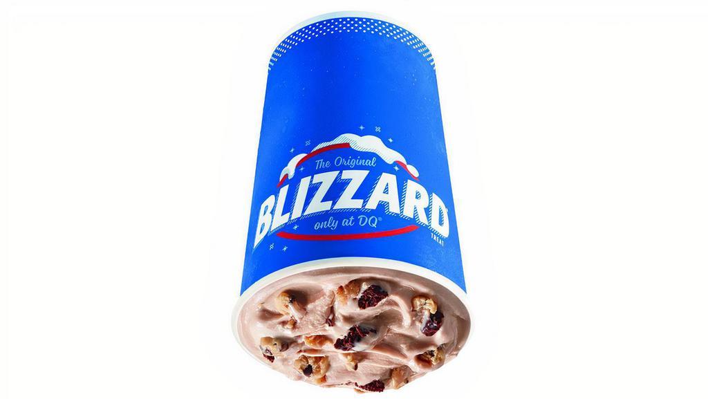 Wonder Woman Cookie Collision Blizzard® Treat · Chocolate chip cookie dough, chocolaty cookie dough, and fudge blended with creamy DQ® vanilla soft serve blended to Blizzard® perfection.
