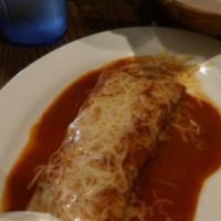 Enchilada · Your choice of beef, chicken or cheese. Topped with sour cream.