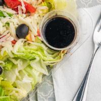 House  Special Salad · Fresh iceberg and romaine lettuce dressed with fresh tomatoes, black olive and mozzarella ch...