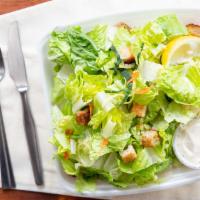 Caesar Salad · Romaine, homemade croutons, and fresh Parmesan cheese tossed in our house-made Caesar dressi...