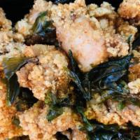 Popcorn Chicken 鹽酥雞 · Fried diced chicken with basil.