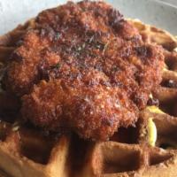 Chicken & Waffle · Fresh waffle served with our crispy chicken patty made in house. Served with a side of butte...