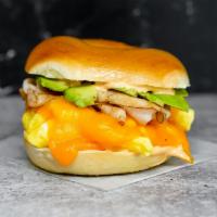 Bagel, Smoked Turkey, Avocado, Egg, & Cheddar Sandwich · 2 scrambled eggs, melted Cheddar cheese, sliced smoked turkey, avocado, and Sriracha aioli o...