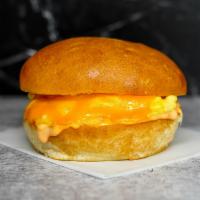 Kaiser Roll, Egg, & Cheddar Sandwich · 2 scrambled eggs, melted Cheddar cheese, and Sriracha aioli on a warm kaiser roll.