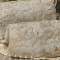 Burrito · With sour cream & guacamole for an additional charge. choice of : Asada | Adobada | Pollo. S...